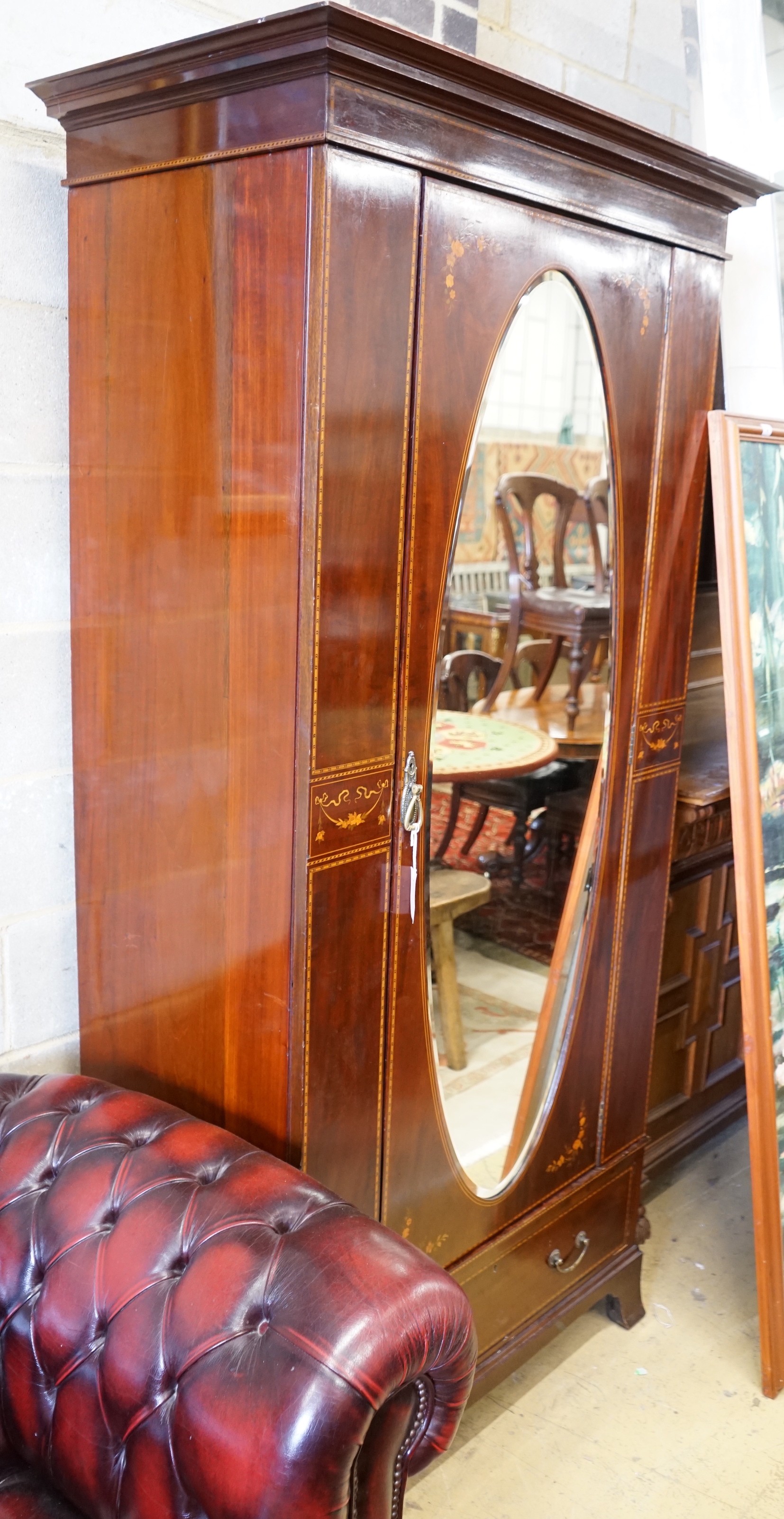 An Edwardian Maple & Co. marquetry inlaid mahogany mirrored door wardrobe, width 104cm, depth 57cm, height 210cm